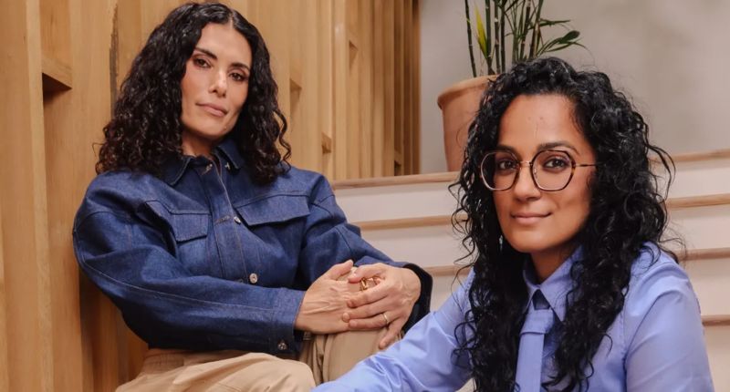 Chani Nicholas (left) with her wife